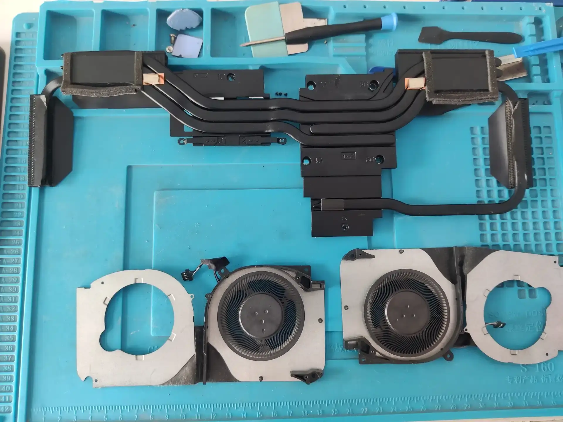 孝感机械革命笔记本电脑清灰换硅脂：笔记本由内到外焕然一新