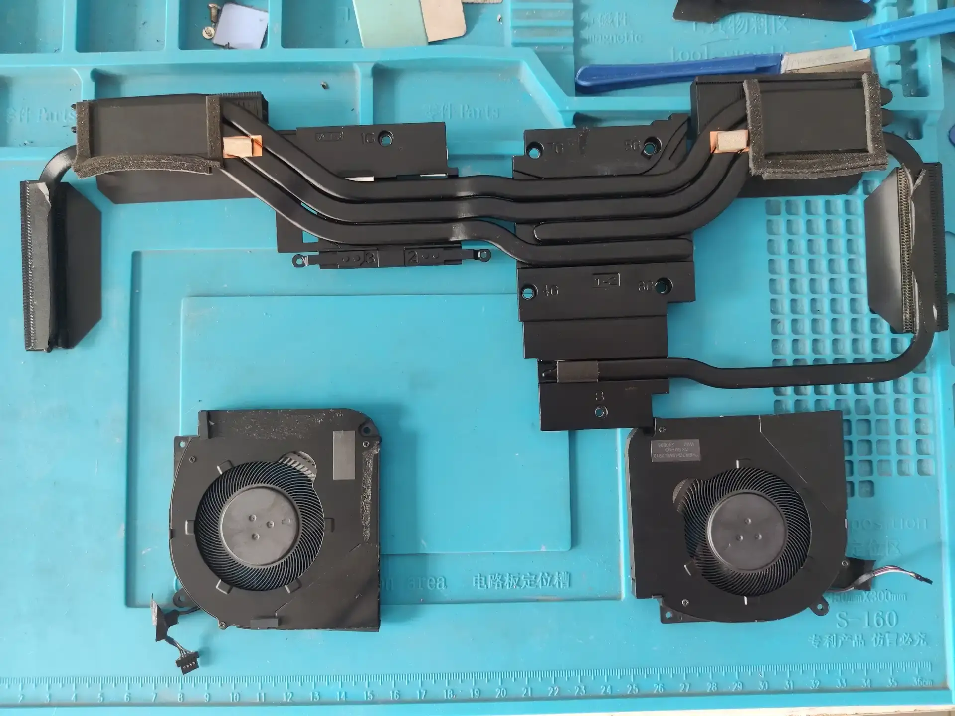 孝感机械革命笔记本电脑清灰换硅脂：笔记本由内到外焕然一新